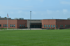 Crete-Monee School Board Tables Vote on Arming Security Director Amid Debate