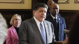 Pritzker signs budget sending millions to NGOs